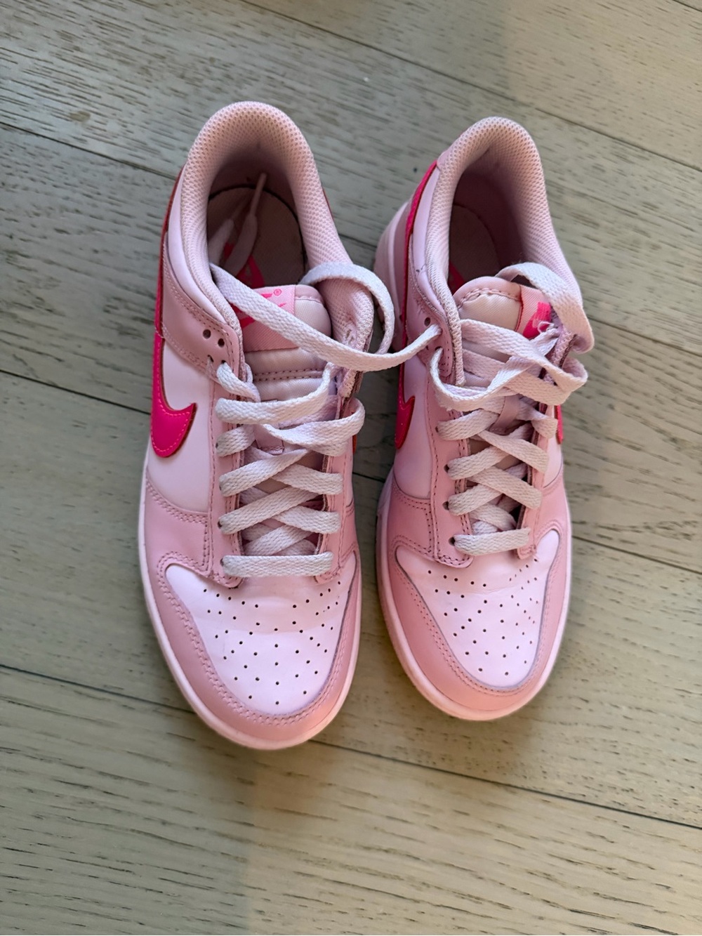 Nike Women's Light Pink Low-Top Sneakers with Hot Pink Swoosh